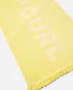 The Rip Curl Premium Surf Towel in Bright Yellow