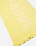 The Rip Curl Premium Surf Towel in Bright Yellow