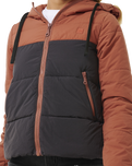 The Rip Curl Womens Anti-Series Contrast Tech Jacket in Rust