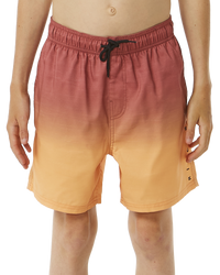 The Rip Curl Boys Boys Fade Volley Shorts in Hot Coral