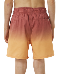 The Rip Curl Boys Boys Fade Volley Shorts in Hot Coral