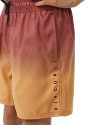 The Rip Curl Boys Boys Fade Volley Shorts in Hot Coral