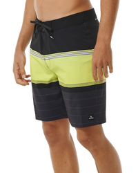 The Rip Curl Mens Mirage Daybreaker Boardshorts in Neon Lime