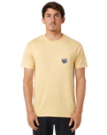 The Rip Curl Mens Badge T-Shirt in Washed Yellow