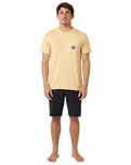 The Rip Curl Mens Badge T-Shirt in Washed Yellow