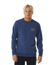 The Rip Curl Mens Stapler Sweatshirt in Washed Navy