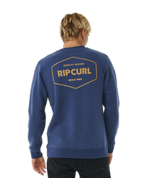 The Rip Curl Mens Stapler Sweatshirt in Washed Navy