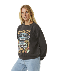 The Rip Curl Womens Tiki Tropic Relaxed Sweatshirt in Washed Black