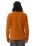 The Rip Curl Mens Anti-Series Search Polar Fleece in Orange Amber