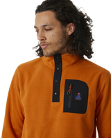 The Rip Curl Mens Anti-Series Search Polar Fleece in Orange Amber