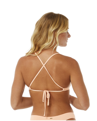 The Rip Curl Womens Classic Surf XBack Tri Bikini Top in Bright Peach