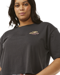 The Rip Curl Womens Rolling Curl Crop T-Shirt in Washed Black