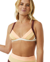 The Rip Curl Womens Block Party Spliced Fixed Tri Bikini Top in Bone