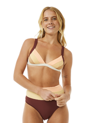 The Rip Curl Womens Block Party Spliced Fixed Tri Bikini Top in Bone