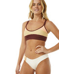 The Rip Curl Womens Block Party Spliced Cheeky Hip Bikini Bottoms in Bone