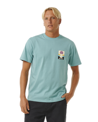 The Rip Curl Mens Surf Revival Peaking T-Shirt in Dusty Blue