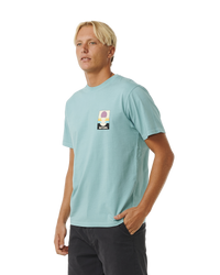 The Rip Curl Mens Surf Revival Peaking T-Shirt in Dusty Blue