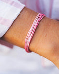 The Pura Vida Boarding 4 Breast Cancer Bracelet in Pink