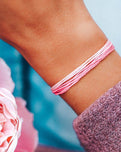 The Pura Vida Boarding 4 Breast Cancer Bracelet in Pink