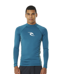 The Rip Curl Waves UPF Performance Rash Vest in Deep Ocean