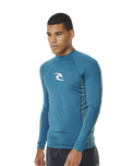 The Rip Curl Waves UPF Performance Rash Vest in Deep Ocean