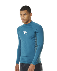 The Rip Curl Waves UPF Performance Rash Vest in Deep Ocean