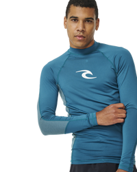 The Rip Curl Waves UPF Performance Rash Vest in Deep Ocean