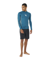 The Rip Curl Waves UPF Performance Rash Vest in Deep Ocean