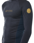 The Rip Curl Dawn Patrol UPF Performance Long Sleeve Rash Vest in Navy Marle