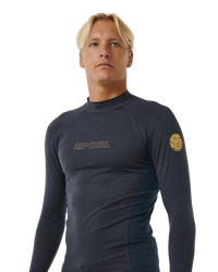 The Rip Curl Dawn Patrol UPF Performance Long Sleeve Rash Vest in Navy Marle