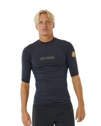 The Rip Curl Dawn Patrol UPF Performance Rash Vest in Navy Marle