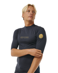 The Rip Curl Dawn Patrol UPF Performance Rash Vest in Navy Marle