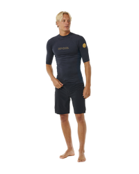 The Rip Curl Dawn Patrol UPF Performance Rash Vest in Navy Marle