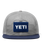 The Yeti Mens Velcro Badge Flat Brim Mesh Cap in Grey & Navy