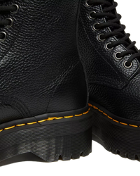 The Dr Martens Womens Sinclair Milled Nappa Leather Platform Boots in Black Milled Napa