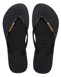 The Havaianas Womens Slim Logo Metallic Flip Flops in Black