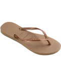 The Havaianas Womens Slim Logo Metallic Flip Flops in Rose Gold