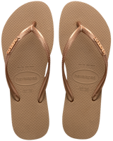 The Havaianas Womens Slim Logo Metallic Flip Flops in Rose Gold