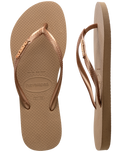 The Havaianas Womens Slim Logo Metallic Flip Flops in Rose Gold