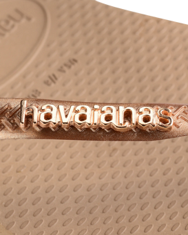 The Havaianas Womens Slim Logo Metallic Flip Flops in Rose Gold