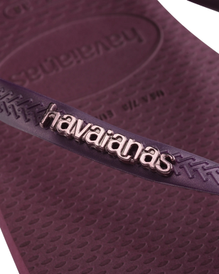 The Havaianas Womens Slim Logo Metallic Flip Flops in Purple Soil