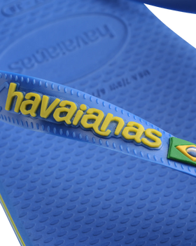 The Havaianas Mens Brasil Logo Neon Flip Flops in Star Blue