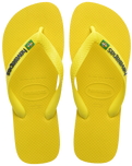 The Havaianas Boys Boys Brasil Logo Neon Flip Flops in Citrus Yellow