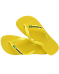 The Havaianas Boys Boys Brasil Logo Neon Flip Flops in Citrus Yellow