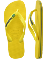 The Havaianas Boys Boys Brasil Logo Neon Flip Flops in Citrus Yellow