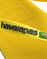 The Havaianas Boys Boys Brasil Logo Neon Flip Flops in Citrus Yellow