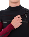 The O'Neill Mens HyperFreak Fire 5/4mm Chest Zip Wetsuit in Black & Dark Red