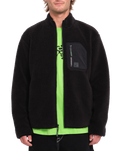 The Volcom Mens Muzzer Fuzzar Zip Fleece Jacket in Black