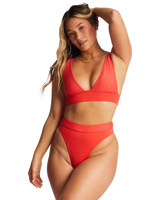 The Billabong Womens Lined Up Remi Plunge Bikini Top in Bright Poppy