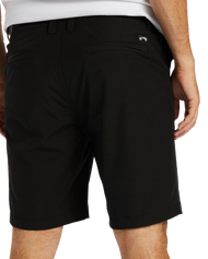 The Billabong Mens Crossfire Solid Walkshorts in Black